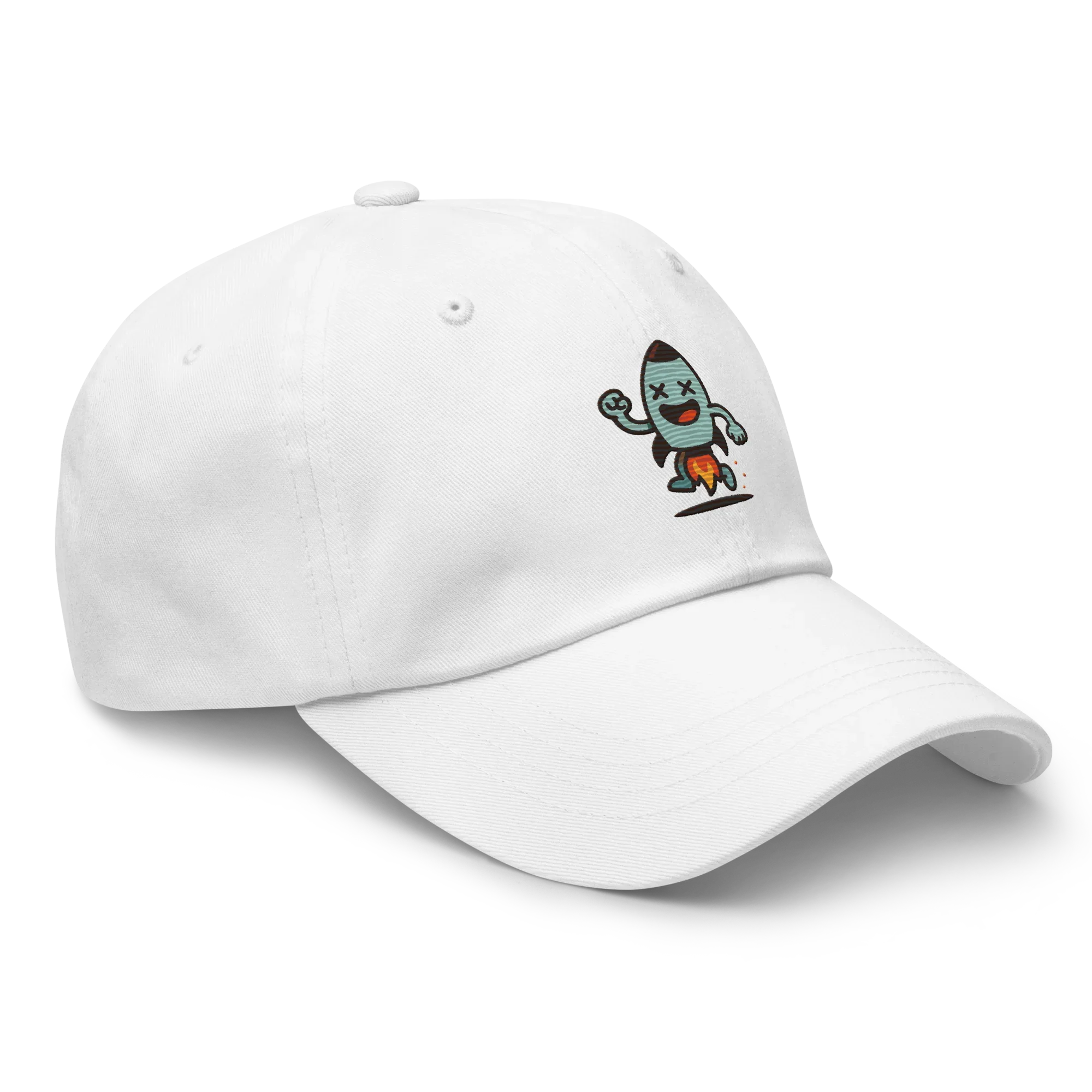 Gorra blanca Doozy Headwear con dibujo de cohete animado en el frontal