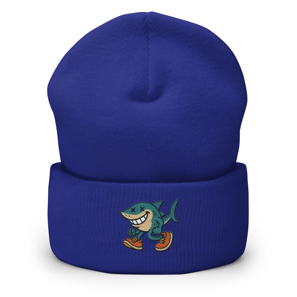 Gorro azul Doozy Headwear con dibujo de tiburón sonriente y tenis, fondo negro