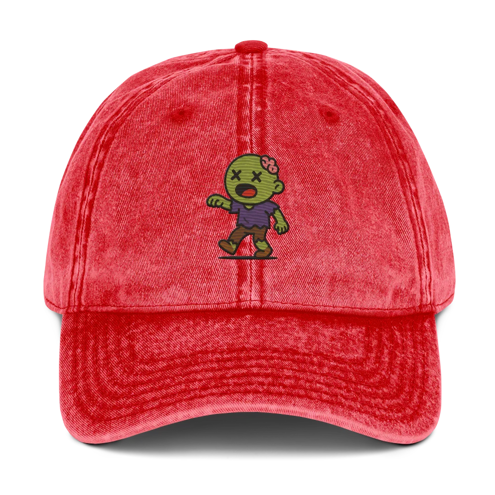 Gorra vintage roja Doozy Headwear con dibujo de zombie bordado al frente